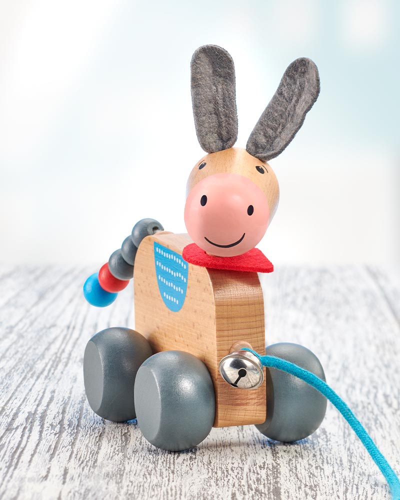 Pepino, der bunter Nachzieh-Esel aus Holz mit einem Glöckchen.