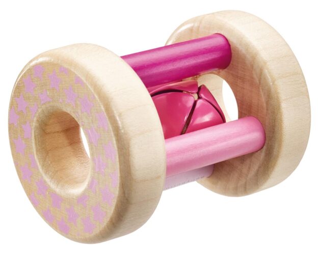 Eine rosa rollende Holzrassel mit einem Glöckchen im Inneren.